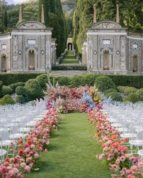 Bright Floral and White Chair Aisle Decor outdoor wedding aisle