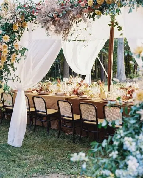 Whimsical Tented Affair outdoor wedding table decor idea