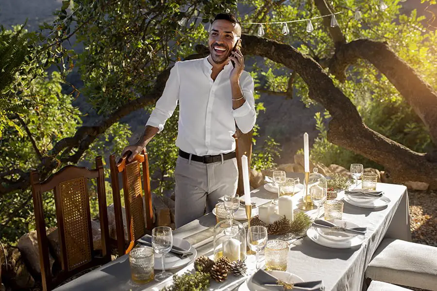 guy attends garden wedding