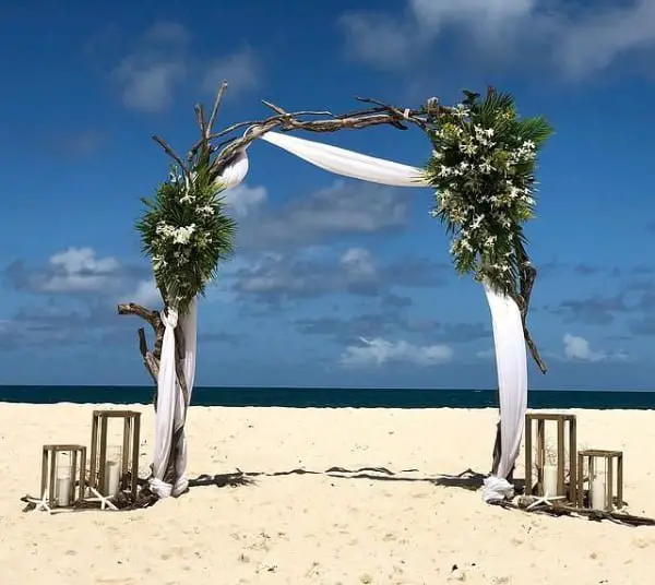 Exquisite Driftwood Beach Wedding Decor In Barbados natural outdoor wedding decoration