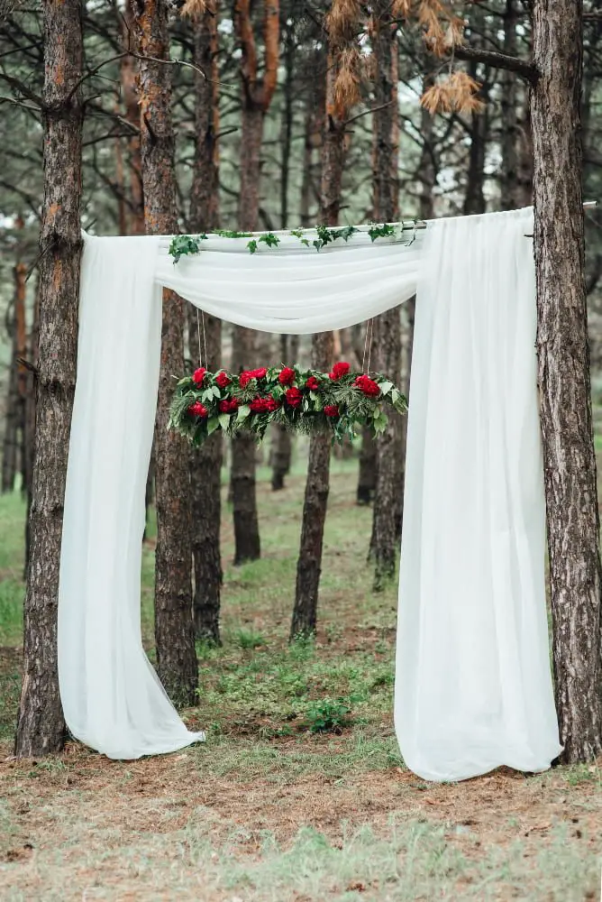 Tulle Draping on trees wedding decor