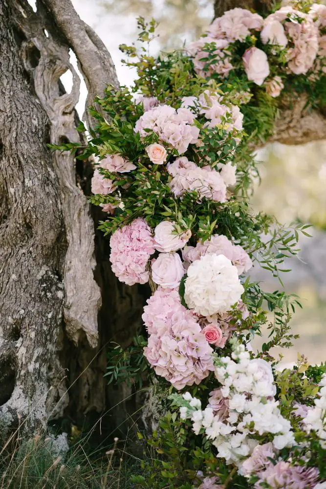 flower arrangements on trees wedding decor