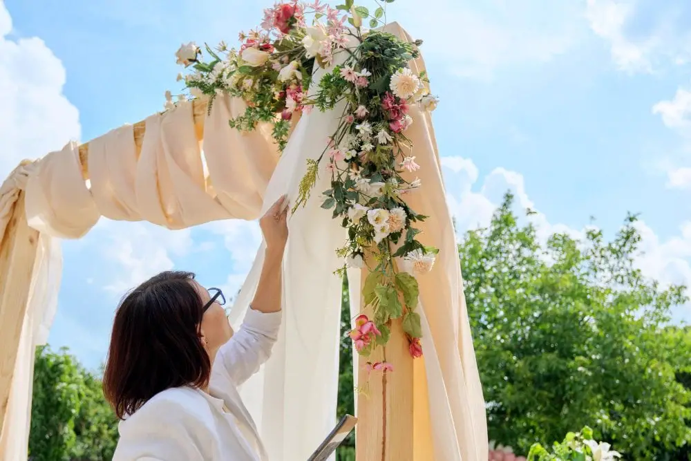 ladies decorating arch