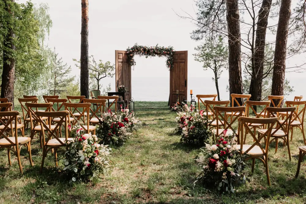 Grassy Aisle With Wildflowers Outdoor Wedding
