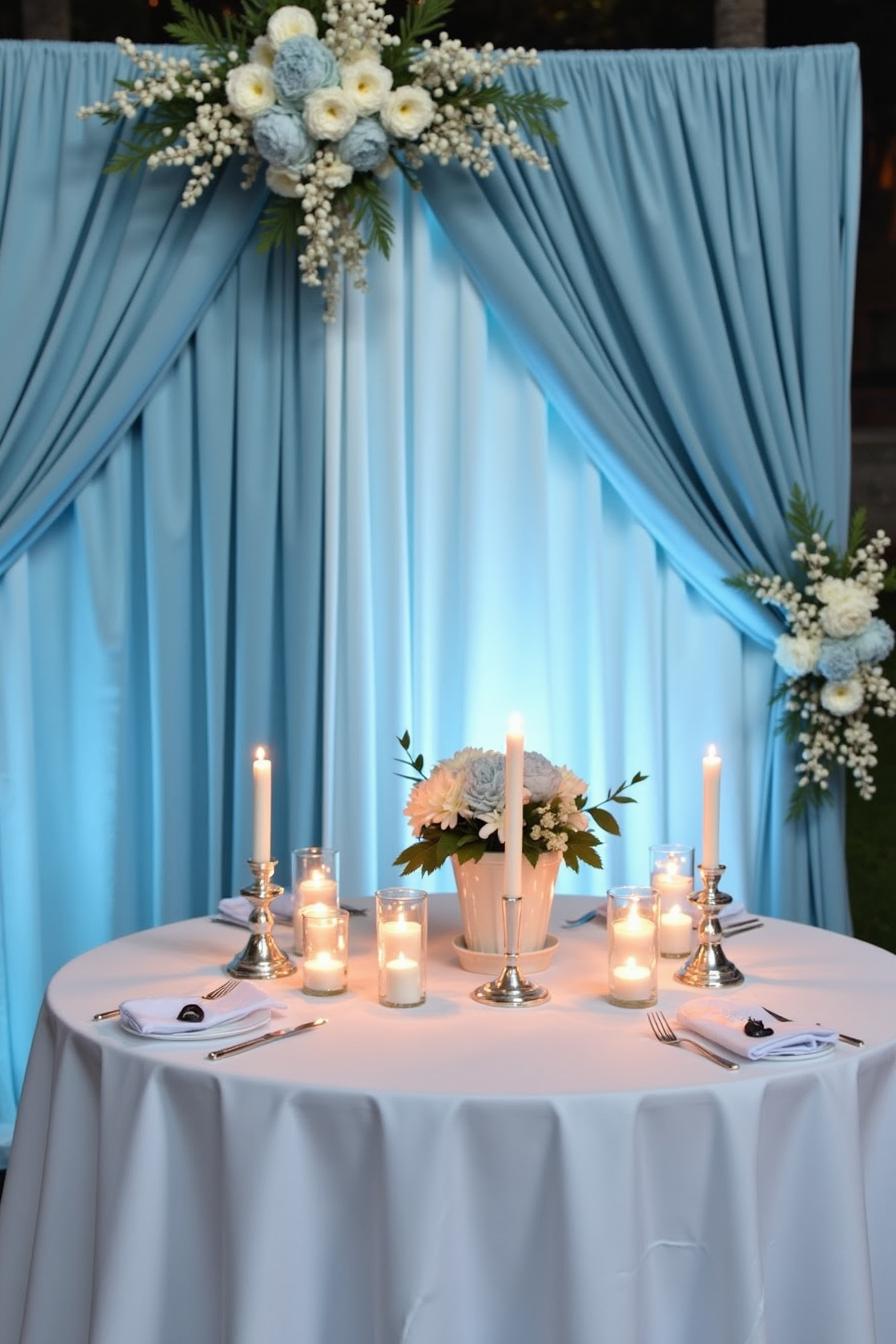 Elegant table with blue drapery and candlelit ambiance